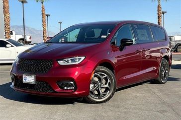 2023 Chrysler Pacifica Plug-in Hybrid Limited in a Velvet Red Pearl Coat exterior color and Blackinterior. I-10 Chrysler Dodge Jeep Ram (760) 565-5160 pixelmotiondemo.com 
