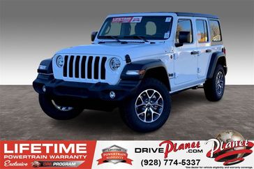 2024 Jeep Wrangler 4-door Sport S in a Bright White Clear Coat exterior color and Blackinterior. Planet Chrysler Dodge Jeep Ram FIAT of Flagstaff (928) 569-5797 planetchryslerdodgejeepram.com 