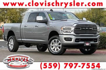 2024 RAM 2500 Laramie Mega Cab 4x4 6'4' Box in a Billet Silver Metallic Clear Coat exterior color and Blackinterior. Clovis Chrysler Dodge Jeep RAM 559-314-1399 clovischryslerdodgejeepram.com 