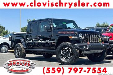 2023 Jeep Gladiator Mojave 4x4 in a Black Clear Coat exterior color and Blackinterior. Clovis Chrysler Dodge Jeep RAM 559-314-1399 clovischryslerdodgejeepram.com 