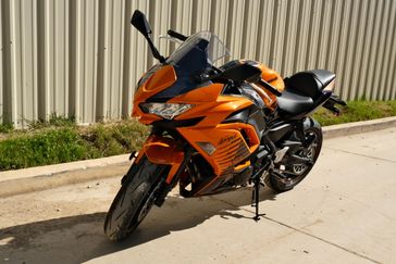 2025 Kawasaki NINJA 650 ABS CANDY STEEL FURNACE ORANGE AND METALLIC SPARK BLACK AND METALLIC ROYAL PURPLE 