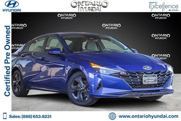 2021 Hyundai Elantra SEL in a Intense Blue exterior color and Medium Grayinterior. Ontario Auto Center ontarioautocenter.com 