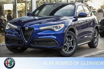 2023 Alfa Romeo Stelvio Ti in a Anodized Blue Metallic exterior color and Blackinterior. Glenview Luxury Imports 847-904-1233 glenviewluxuryimports.com 