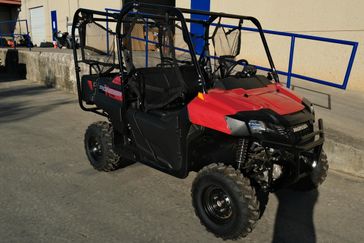 NEW 2026 HONDA PIONEER 7004  in a HERO RED exterior color. Family PowerSports (877) 886-1997 familypowersports.com 