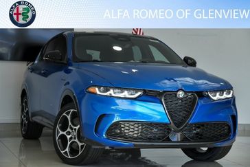2024 Alfa Romeo Tonale Veloce Eawd in a Misano Blue Metallic exterior color and Red/Blackinterior. Alfa Romeo of Glenview 847-558-1263 alfaromeoglenview.com 