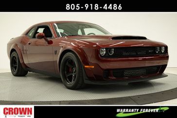 2018 Dodge Challenger SRT Demon in a Octane Red Pearl Coat exterior color and Blackinterior. Ventura Auto Center 866-978-2178 venturaautocenter.com 