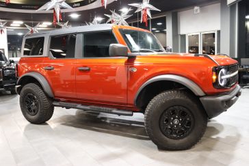 2022 Ford Bronco Wildtrak in a Chili Pepper Red exterior color and Black Onyxinterior. J Star Chrysler Dodge Jeep Ram of Anaheim Hills 888-802-2956 jstarcdjrofanaheimhills.com 