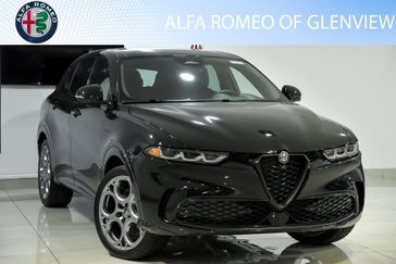 2024 Alfa Romeo Tonale Veloce Eawd in a Alfa Black exterior color and Red/Blackinterior. Alfa Romeo of Glenview 847-558-1263 alfaromeoglenview.com 
