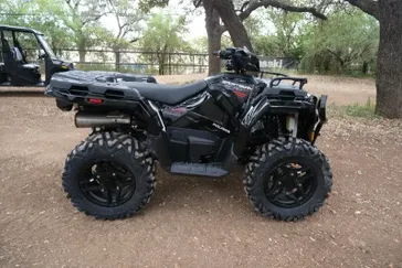 2025 POLARIS SPORTSMAN 570 TRAIL ONYX BLACK in a ONYX BLACK exterior color. Family PowerSports (877) 886-1997 familypowersports.com 