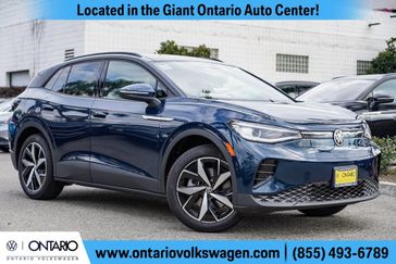 2023 Volkswagen ID.4 S in a Tourmaline Blue Metallic exterior color and Gray W/Blue Bolstersinterior. Ontario Auto Center ontarioautocenter.com 