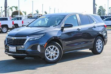 2022 Chevrolet Equinox LT in a Iron Gray Metallic exterior color and Jet Blackinterior. Ventura Auto Center 866-978-2178 venturaautocenter.com 