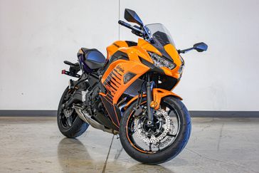 2025 Kawasaki NINJA 650 ABS CANDY STEEL FURNACE ORANGE AND METALLIC SPARK BLACK AND METALLIC ROYAL PURPLE 