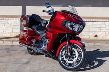 2024 INDIAN MOTORCYCLE PURSUIT LIMITED SUNSET RED METALLIC 49ST in a RED exterior color. Family PowerSports (877) 886-1997 familypowersports.com 