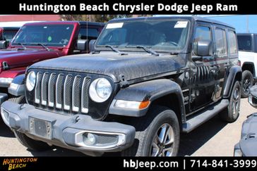 2020 Jeep Wrangler Sahara in a Black exterior color. BEACH BLVD OF CARS beachblvdofcars.com 