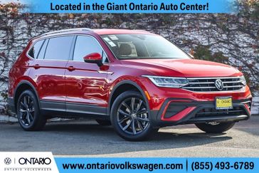 2024 Volkswagen Tiguan 2.0T SE in a Kings Red Metallic exterior color and Cinnamoninterior. Ontario Auto Center ontarioautocenter.com 