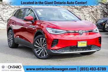 2023 Volkswagen ID.4 Pro S Plus in a Aurora Red Metallic w/Black Roof exterior color and Grayinterior. Ontario Auto Center ontarioautocenter.com 