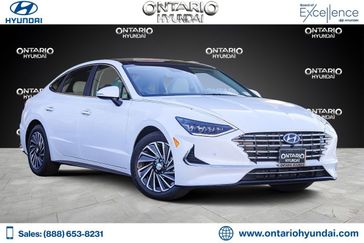 2023 Hyundai Sonata Hybrid Limited in a Serenity White exterior color and Dark Grayinterior. Ontario Auto Center ontarioautocenter.com 