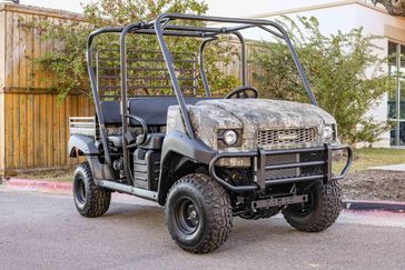 NEW 2026 KAWASAKI MULE 4010 TRANS4X4  in a TRUETIMBER STRATA exterior color. Family PowerSports (877) 886-1997 familypowersports.com 