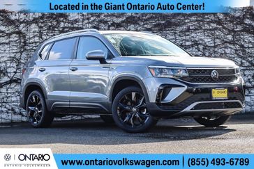2023 Volkswagen Taos 1.5T SE in a Pyrite Silver Metallic exterior color and Blackinterior. Ontario Auto Center ontarioautocenter.com 