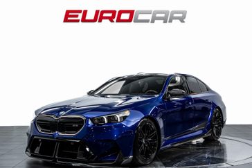 2025 BMW M5 *EXECUTIVE PACKAGE * HUGE CARBON OPTIONS* in a Marina Bay Blue Metallic exterior color and Blackinterior. Eurocars OC 949-722-7121 eurocaroc.com 