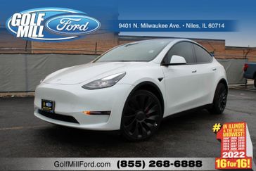 2022 Tesla Model Y Performance in a White exterior color and Blackinterior. Glenview Luxury Imports 847-904-1233 glenviewluxuryimports.com 