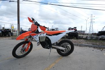 2023 KTM 125 XC ORANGE in a ORANGE exterior color. Family PowerSports (877) 886-1997 familypowersports.com 