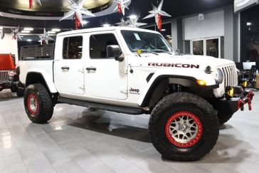 2020 Jeep Gladiator Rubicon in a Bright White Clear Coat exterior color and Blackinterior. J Star Chrysler Dodge Jeep Ram of Anaheim Hills 888-802-2956 jstarcdjrofanaheimhills.com 