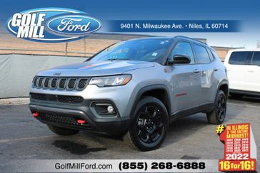 2023 Jeep Compass Trailhawk in a Billet Silver Metallic Clear Coat exterior color and Ruby Red/Blackinterior. Glenview Luxury Imports 847-904-1233 glenviewluxuryimports.com 