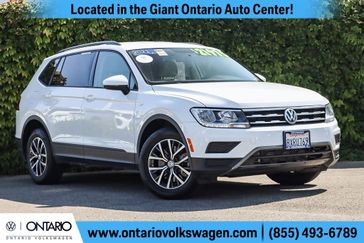 2021 Volkswagen Tiguan 2.0T S in a White exterior color and Storm Grayinterior. Ontario Auto Center ontarioautocenter.com 