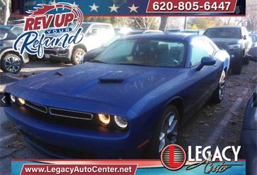 2022 Dodge Challenger SXT in a Indigo Blue exterior color and Blackinterior. Legacy Auto Center 620-315-9264 legacyautocenter.net 