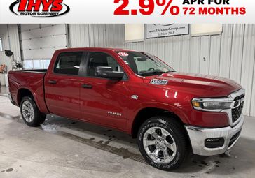 New 2026 RAM 1500 Big Horn Crew Cab 4x4 5'7' Box in a Molten Red Pearl Coat exterior color and Diesel Gray/Blackinterior. Thys Motor Company 319-318-6640 thysmotorco.com 