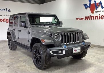 2023 Jeep Wrangler Sahara 4xe in a Sting-Gray Clear Coat exterior color and Blackinterior. Wnnie Dodge 000-000-0000 pixelmotiondemo.com 
