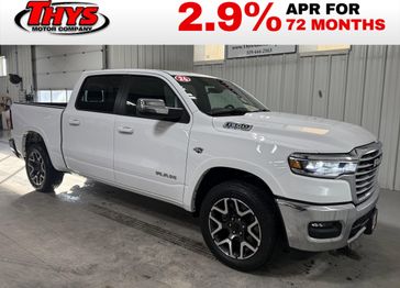 New 2026 RAM 1500 Laramie Crew Cab 4x4 5'7' Box in a Bright White Clear Coat exterior color and Blackinterior. Thys Motor Company 319-318-6640 thysmotorco.com 