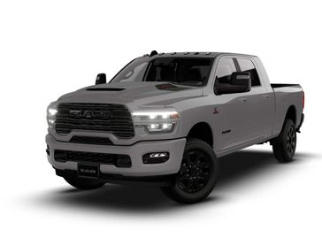 New 2026 RAM 2500 Laramie Mega Cab 4x4 6'4' Box in a Ceramic Gray Clear Coat exterior color. Kamaaina Motors 1-808-746-7956 kamaainamotors.com 