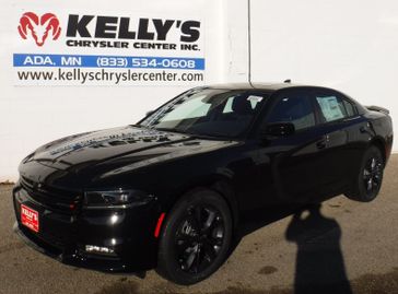 2023 Dodge Charger SXT Awd in a Pitch Black exterior color. Kelly’s Chrysler Center 888-806-1140 pixelmotiondemo.com 