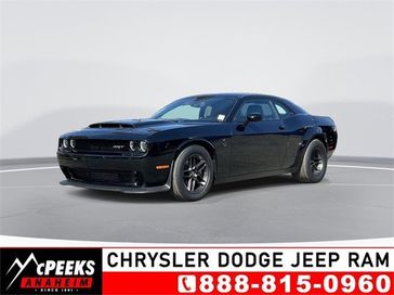 2023 Dodge Challenger Srt Demon in a Pitch Black Clear Coat exterior color. McPeek's Chrysler Dodge Jeep Ram of Anaheim 888-861-6929 mcpeeksdodgeanaheim.com 