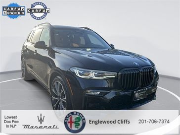2021 BMW X7 M50i in a Carbon Black Metallic exterior color and Cognacinterior. Englewood Cliffs Alfa Romeo 201-706-7374 alfaromeoec.com 
