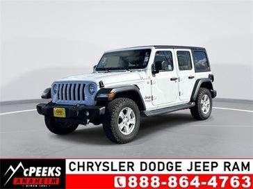 2018 Jeep Wrangler Unlimited Sport S in a Bright White Clear Coat exterior color and Blackinterior. McPeek's Chrysler Dodge Jeep Ram of Anaheim 888-861-6929 mcpeeksdodgeanaheim.com 