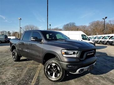2022 RAM 1500 Rebel in a Granite Crystal Metallic Clear Coat exterior color and Red/Blackinterior. Glenview Luxury Imports 847-904-1233 glenviewluxuryimports.com 