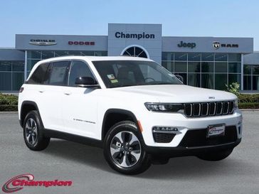 2024 Jeep Grand Cherokee 4xe in a Bright White Clear Coat exterior color and CAPRI LEATHEREinterior. Champion Chrysler Jeep Dodge Ram 800-549-1084 pixelmotiondemo.com 
