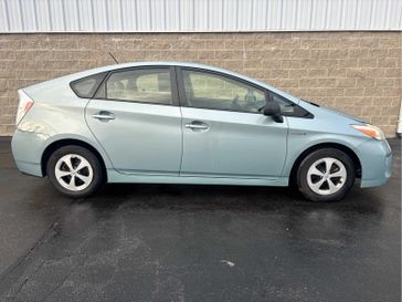 2012 Toyota Prius One in a SEA GLASS PEARL exterior color and BISQUEinterior. Wilmington Auto Center Chrysler Dodge Jeep Ram (937) 556-6430 wilmingtonautocentercdjr.com 