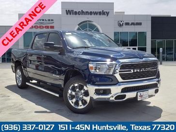 2023 RAM 1500 Lone Star Crew Cab 4x4 5'7' Box in a Patriot Blue Pearl Coat exterior color and Diesel Gray/Blackinterior. Wischnewsky Dodge 936-755-5310 wischnewskydodge.com 