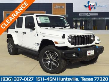 2024 Jeep Wrangler 4-door Sport S 4xe in a Bright White Clear Coat exterior color and Blackinterior. Wischnewsky Dodge 936-755-5310 wischnewskydodge.com 