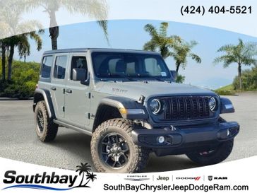 New 2026 Jeep Wrangler Willys in a Gray exterior color and Blackinterior. Southbay Chrysler Jeep Dodge Ram (424) 404-5521 pixelmotiondemo.com 
