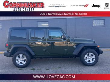 2022 Jeep Wrangler Unlimited Sport S 4x4 in a Sarge Green Clear Coat exterior color and Blackinterior. Cornhusker Auto Center 402-866-8665 cornhuskerautocenter.com 