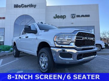 2024 RAM 3500 Tradesman Crew Cab 4x4 6'4' Box in a Bright White Clear Coat exterior color and Diesel Gray/Blackinterior. McCarthy Jeep Ram 816-434-0674 mccarthyjeepram.com 