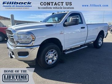 2024 RAM 3500 Tradesman Regular Cab 4x4 8' Box in a Bright White Clear Coat exterior color. Fillback Chrysler 6083754664 