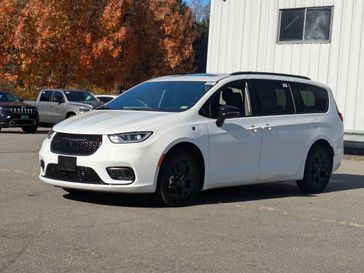 2024 Chrysler Pacifica Plug-in Hybrid Premium S Appearance in a Bright White Clear Coat exterior color and Blackinterior. Brattleboro CDJR 802-251-1111 brattleborocdjr.com 