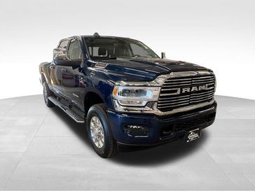 2024 RAM 2500 Laramie Crew Cab 4x4 6'4' Box in a Patriot Blue Pearl Coat exterior color and Blackinterior. Sheridan Motors Auto (307) 218-2217 sheridanmotors.com 