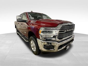 2024 RAM 2500 Laramie Mega Cab 4x4 6'4' Box in a Delmonico Red Pearl Coat exterior color and Blackinterior. Sheridan Motors Auto (307) 218-2217 sheridanmotors.com 